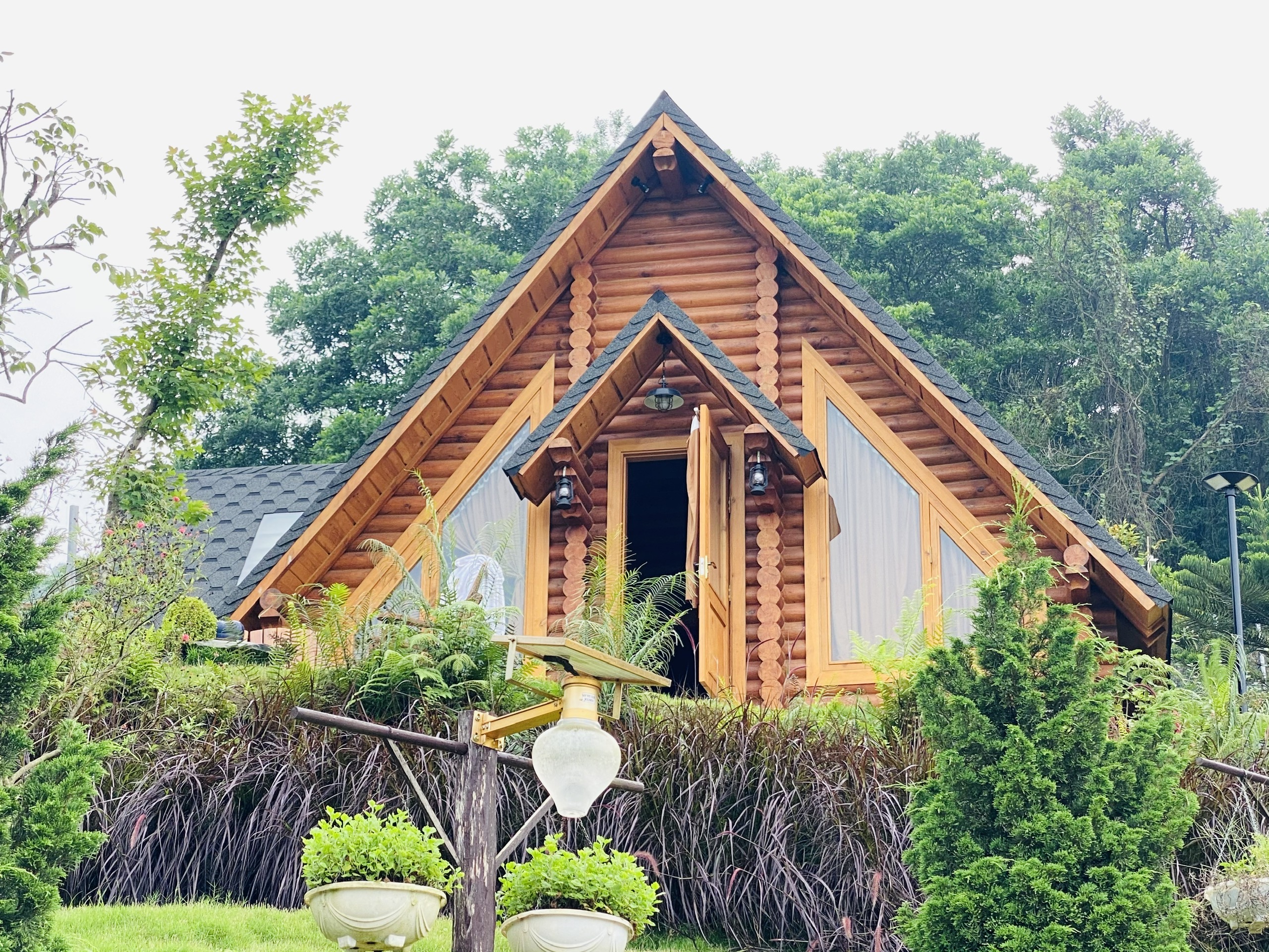 077.nhung kieu nha go bao loc dep de nghi duong khoa lam group